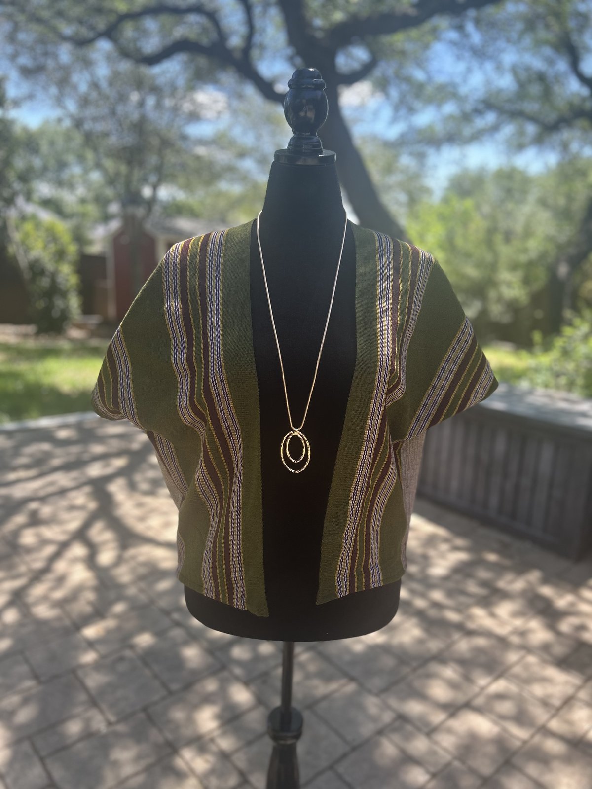 Striped top styled with necklace